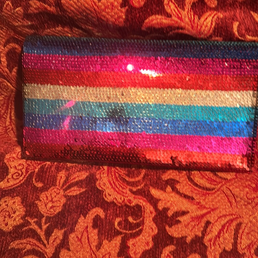 J Renee multi-color clutch purse w/Gold attached shoulder strap.